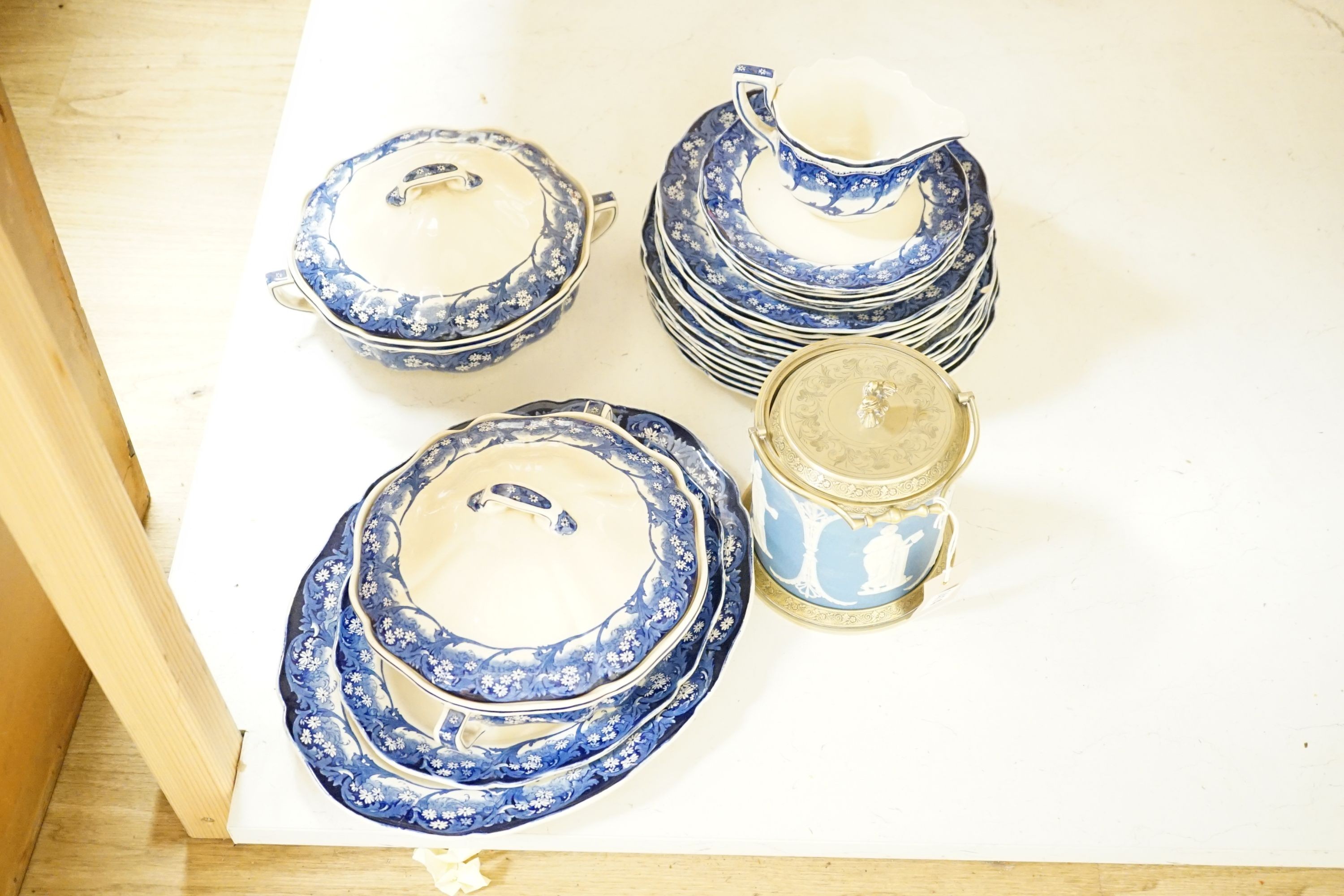 A Royal Doulton ‘Marjorie’ blue and white part dinner service and a Victorian jasper ware and electroplate mounted biscuit box, biscuit box, 17 cms high.